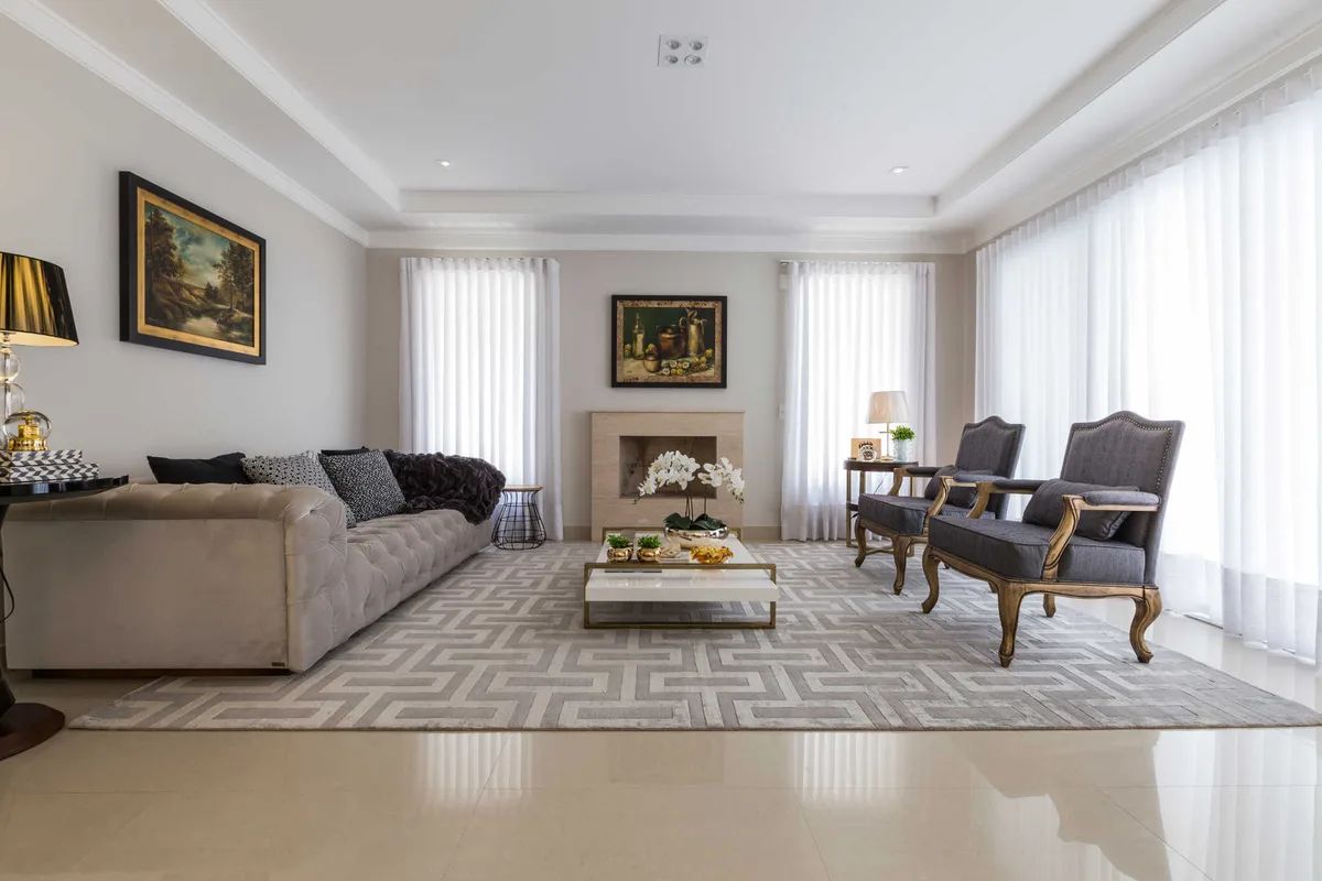 Sala de estar da Casa Alpha Conde II, projeto de interiores em Alphaville, Barueri - SP assinado pela Meira Martins (imagem 1 de 19)